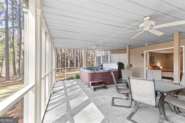 404 Golden Delicious Rd, Clarkesville, GA 30523 - sunroom / solarium with a ceiling fan, outdoor dining area, and a jacuzzi