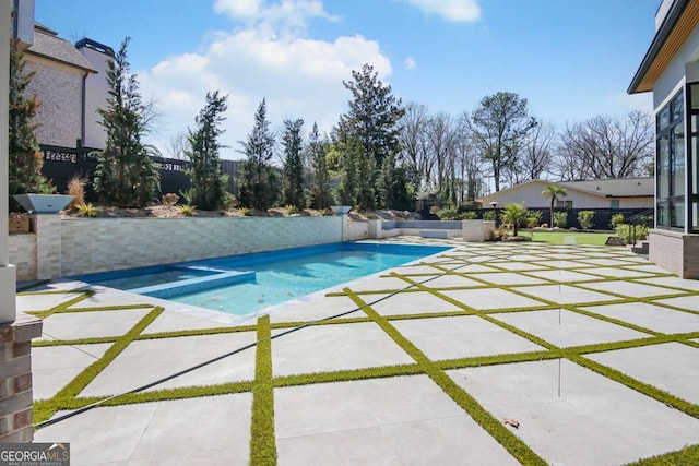 view of pool featuring a patio area, a fenced backyard, and a fenced in pool
