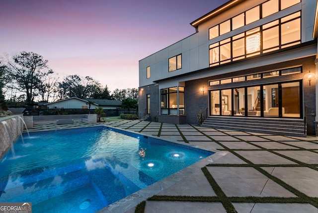 view of swimming pool with fence private yard, a patio area, and a fenced in pool
