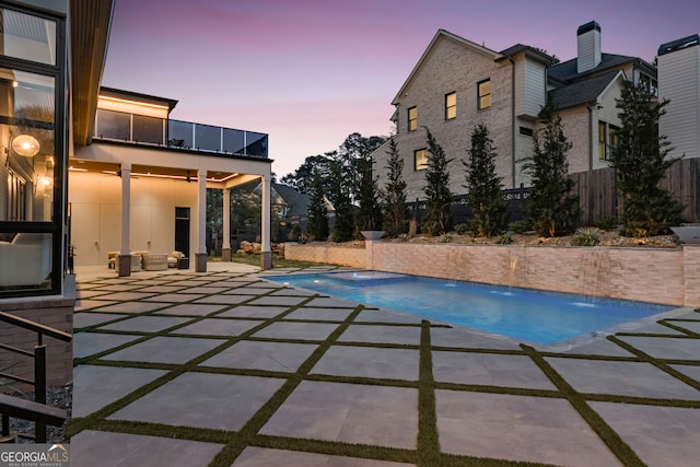 view of pool with fence, a patio area, and a fenced in pool