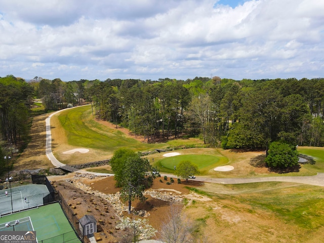 surrounding community featuring view of golf course