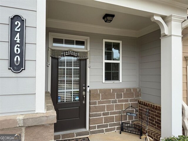 2460 Laurel Gate Ln, Cumming, GA 30040 - entrance to property featuring a porch