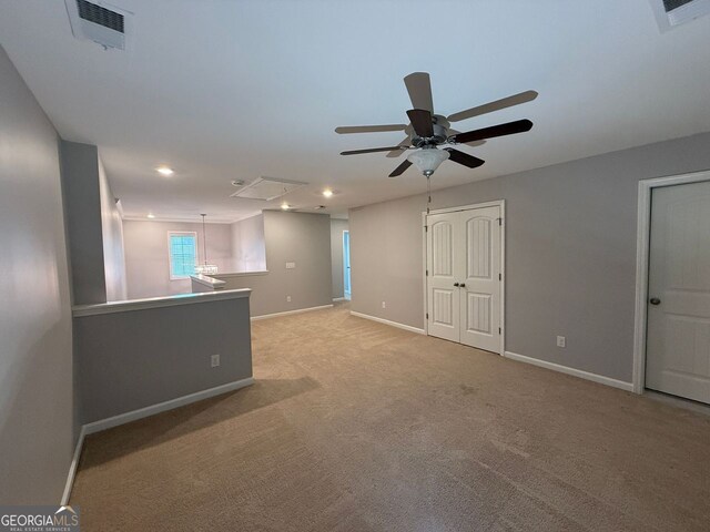 2460 Laurel Gate Ln, Cumming, GA 30040 - unfurnished bedroom with a walk in closet, visible vents, and light colored carpet