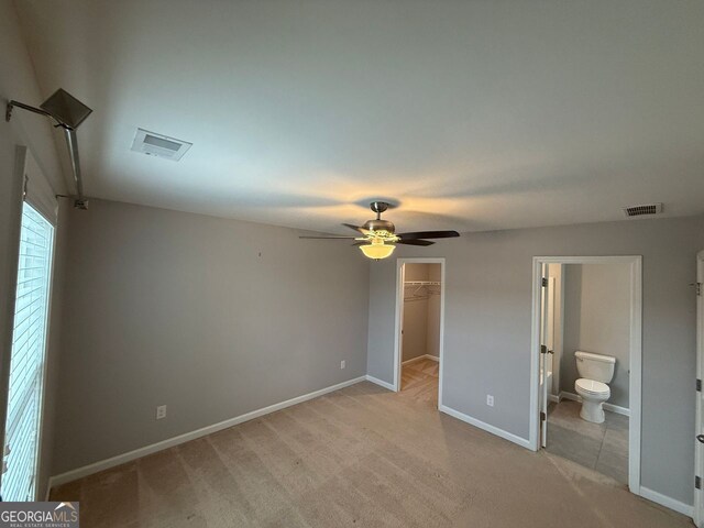 2460 Laurel Gate Ln, Cumming, GA 30040 - unfurnished bedroom with attic access, light carpet, and baseboards
