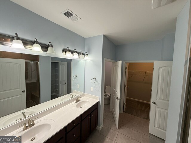 2460 Laurel Gate Ln, Cumming, GA 30040 - walk in closet with tile patterned floors