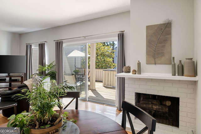 3772 Paces Ferry W SE, Atlanta, GA 30339 - living room with light wood finished floors and a fireplace