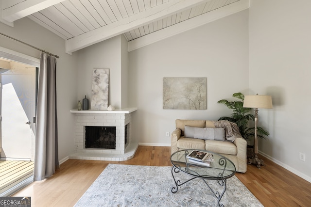 3772 Paces Ferry W SE, Atlanta, GA 30339 - living area featuring a fireplace, wood finished floors, wood ceiling, and baseboards