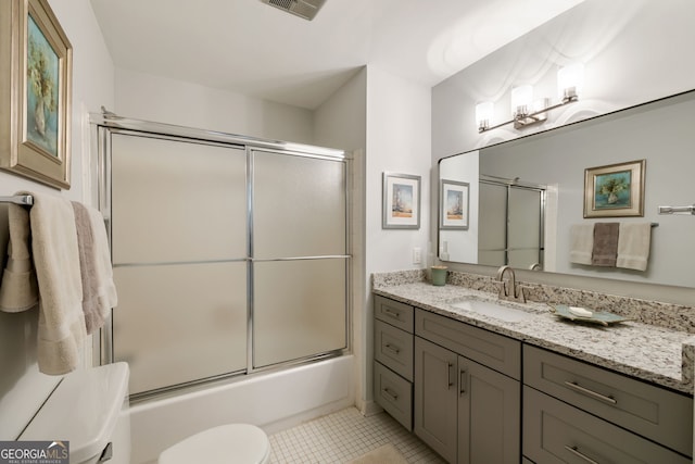 3772 Paces Ferry W SE, Atlanta, GA 30339 - full bathroom featuring toilet, tile patterned flooring, vanity, and shower / bath combination with glass door
