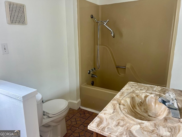 bathroom with tile patterned floors, bathtub / shower combination, toilet, vanity, and visible vents