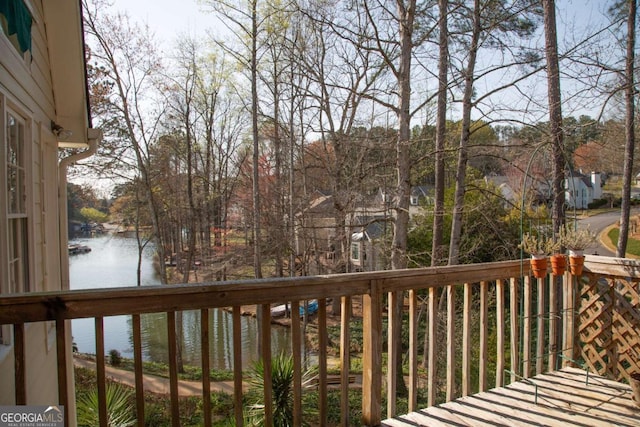 deck featuring a water view