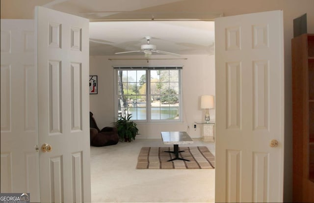 hallway featuring carpet