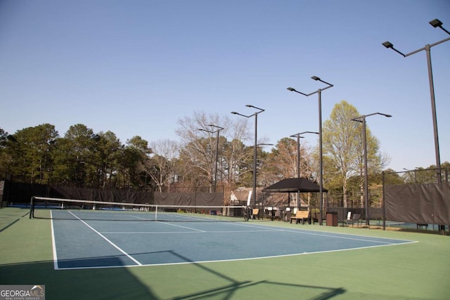 view of sport court with fence and community basketball court