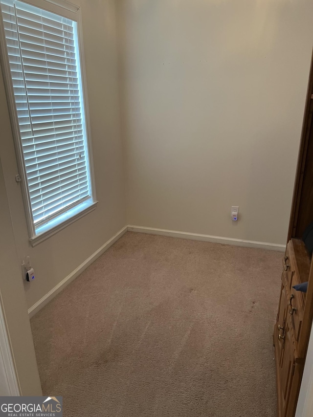4 Baldwin Pl SE, Moultrie, GA 31788 - carpeted spare room with baseboards