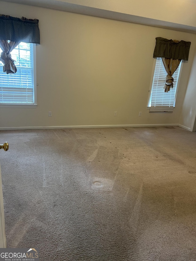 4 Baldwin Pl SE, Moultrie, GA 31788 - unfurnished room featuring baseboards and carpet flooring