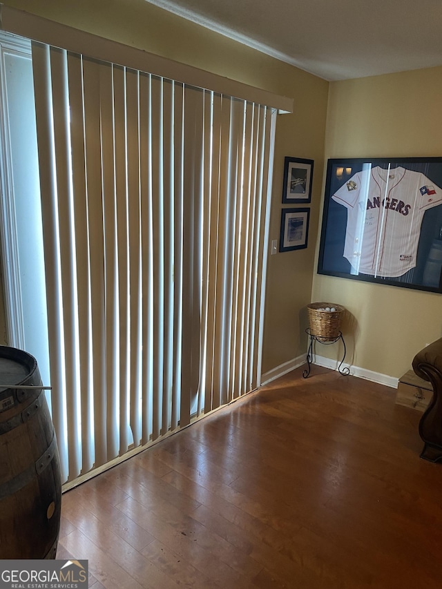 4 Baldwin Pl SE, Moultrie, GA 31788 - unfurnished room featuring wood finished floors and baseboards