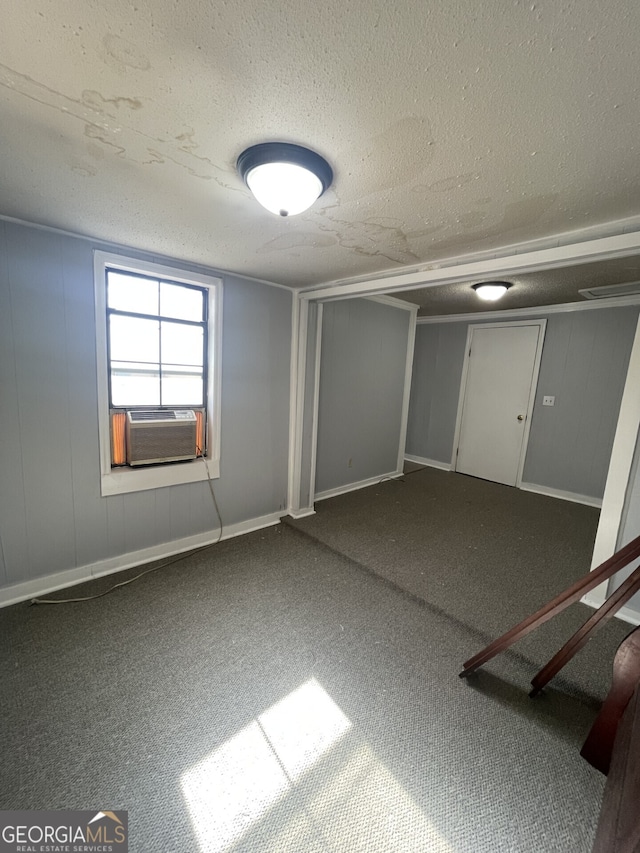 1911 Park Ave S, Tifton, GA 31794 - unfurnished room with cooling unit, a textured ceiling, and carpet