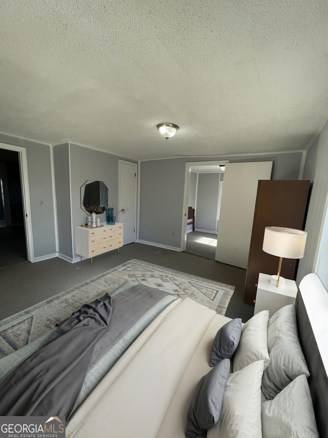1911 Park Ave S, Tifton, GA 31794 - bedroom featuring a textured ceiling
