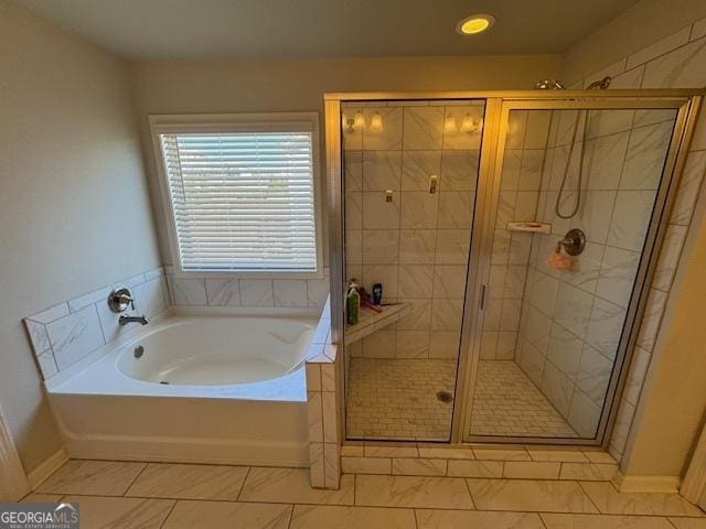 5530 Lacebark Pine Ct, Cumming, GA 30040 - bathroom with a bath and a stall shower