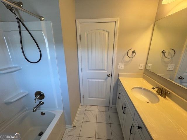 5530 Lacebark Pine Ct, Cumming, GA 30040 - full bath featuring vanity and washtub / shower combination