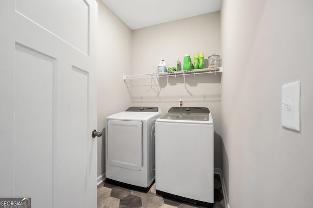 laundry room featuring laundry area and separate washer and dryer