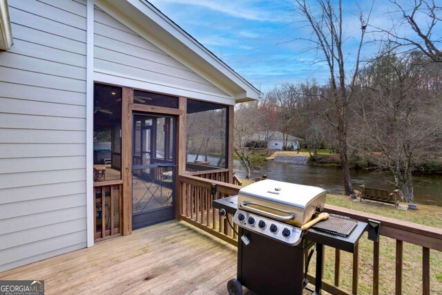765 River Oaks Dr, Hayesville, NC 28904 - wooden terrace with grilling area, a water view, and a sunroom