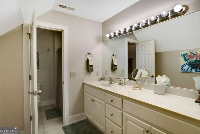 765 River Oaks Dr, Hayesville, NC 28904 - bathroom featuring tile patterned floors, toilet, vanity, lofted ceiling, and visible vents