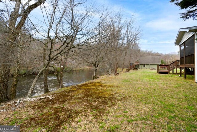 765 River Oaks Dr, Hayesville, NC 28904 - view of yard featuring stairs and a sunroom