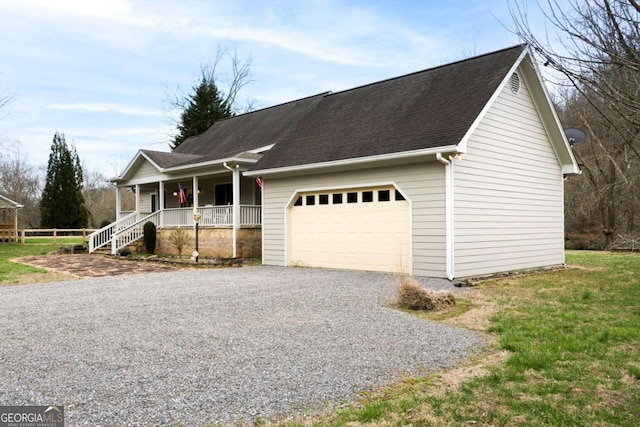 765 River Oaks Dr, Hayesville, NC 28904 - view of front of house with driveway, covered porch, a garage, and a shingled roof