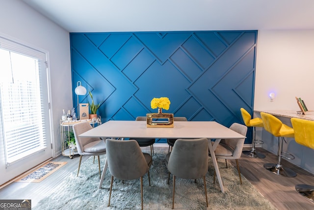 3132 Meadowstone Ln SW, Atlanta, GA 30331 - dining room featuring wood finished floors and a decorative wall