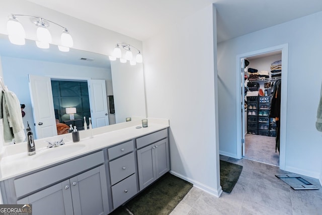 3132 Meadowstone Ln SW, Atlanta, GA 30331 - ensuite bathroom featuring double vanity and a walk in closet