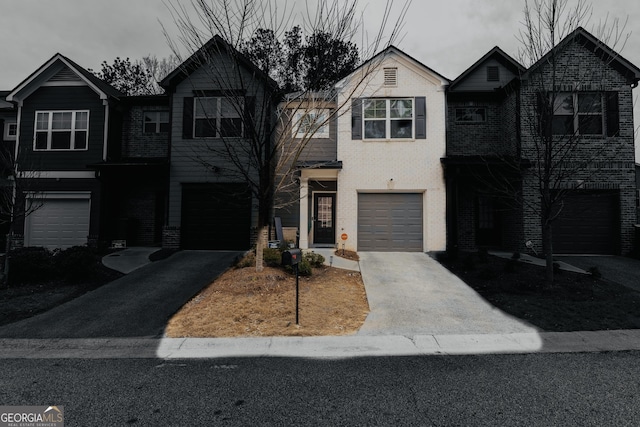 3132 Meadowstone Ln SW, Atlanta, GA 30331 - view of front of home featuring an attached garage, driveway, and brick siding