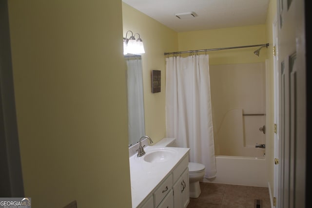 bathroom with visible vents, toilet, tile patterned floors, vanity, and shower / bath combination with curtain