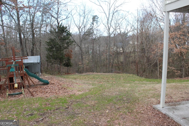 view of yard with a playground