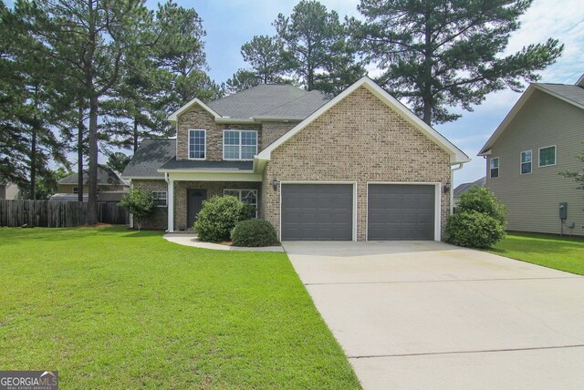 139 Forestbrooke Way, Bonaire, GA 31005 - view of front facade with brick siding, a garage, and concrete driveway