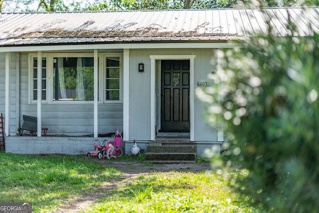 403 Spurgeon St, Waycross, GA 31501 - property entrance featuring metal roof