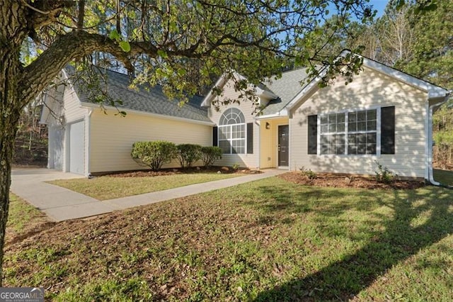 4625 Thermal Ct, Douglasville, GA 30135 - traditional-style home with driveway, a front yard, and a garage