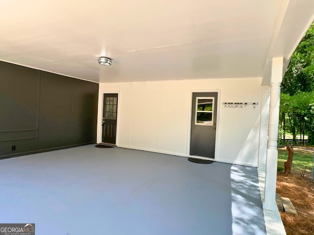 entrance to property with a patio