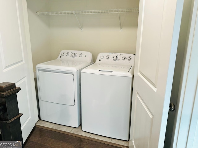 124 Auburn Run Ln, Auburn, GA 30011 - laundry area featuring independent washer and dryer and wood finished floors