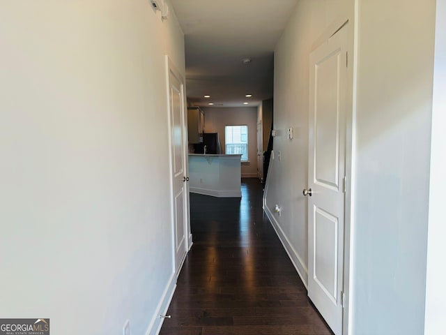 124 Auburn Run Ln, Auburn, GA 30011 - hall featuring dark wood finished floors, baseboards, and recessed lighting