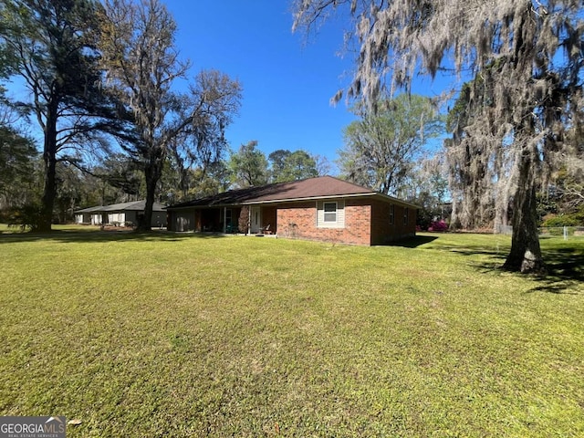 411 Woodland Dr, Hinesville, GA 31313 - view of yard