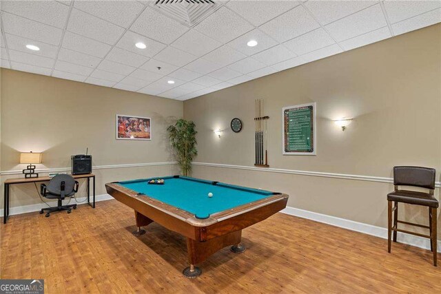 playroom featuring a drop ceiling, baseboards, pool table, and wood finished floors