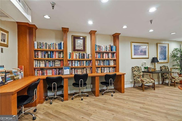 office area with recessed lighting and wood finished floors