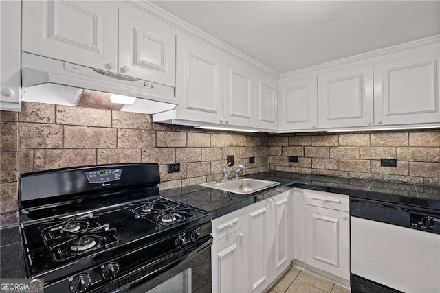 kitchen with a sink, white dishwasher, under cabinet range hood, gas stove, and white cabinets