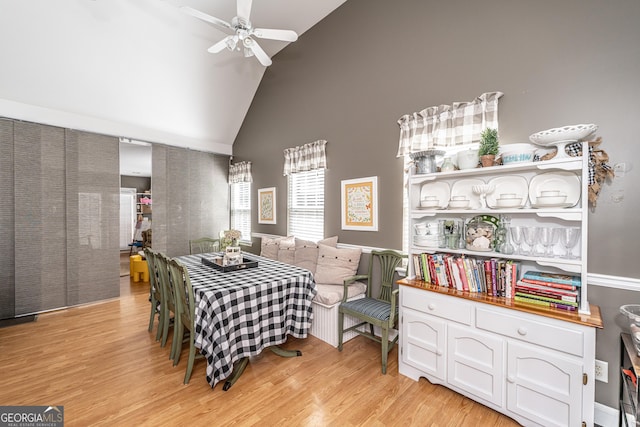 37 Covered Springs Dr NE, Rome, GA 30165 - dining room featuring light wood-style flooring, high vaulted ceiling, and ceiling fan
