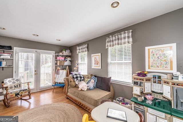 37 Covered Springs Dr NE, Rome, GA 30165 - living area with recessed lighting, light wood-style flooring, and french doors
