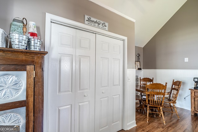 37 Covered Springs Dr NE, Rome, GA 30165 - dining space with dark wood-type flooring, vaulted ceiling, and wainscoting