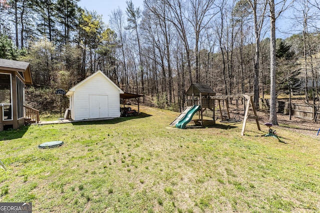 37 Covered Springs Dr NE, Rome, GA 30165 - view of yard featuring a playground, an outbuilding, a view of trees, and a storage shed