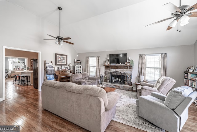 37 Covered Springs Dr NE, Rome, GA 30165 - living room with a fireplace, wood finished floors, ceiling fan, and a healthy amount of sunlight