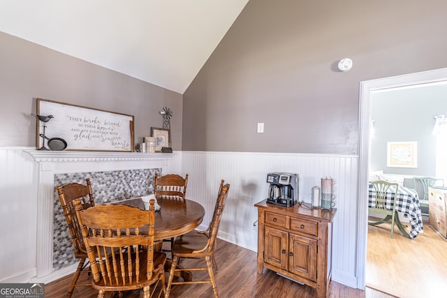 37 Covered Springs Dr NE, Rome, GA 30165 - dining area featuring a wainscoted wall, lofted ceiling, and wood finished floors