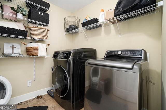 3227 Aviary Ct NW, Acworth, GA 30101 - washroom with washing machine and dryer, baseboards, and tile patterned flooring